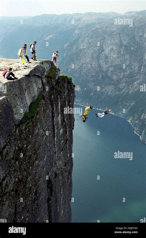 Jumpers From All Over The World Come To The Meter High Cliff