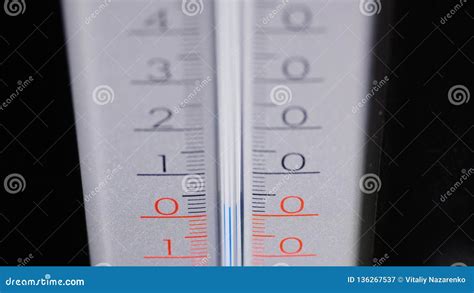 Alcohol Thermometer On A Black Background Shows The Temperature Of The