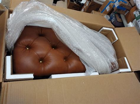 Nativebid Auction Services Dsm River Of Goods Tan Tufted Faux Leather