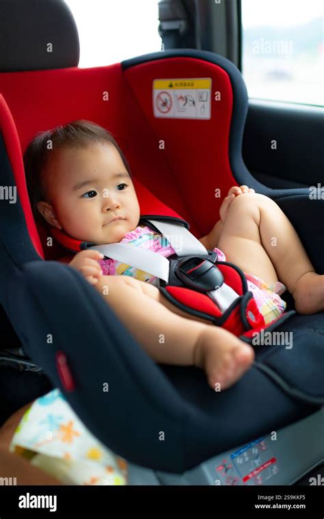Baby In Car Seat Stock Photo Alamy