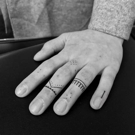 Snake Rose And Number Tattoos On The Fingers Tattoogrid Net