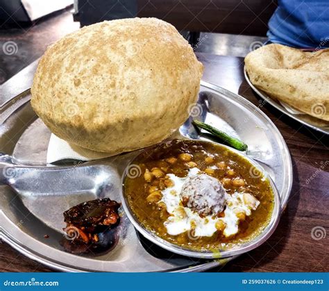 Indian Street Food Called Chole Bhature At Restaurant In Delhi Stock