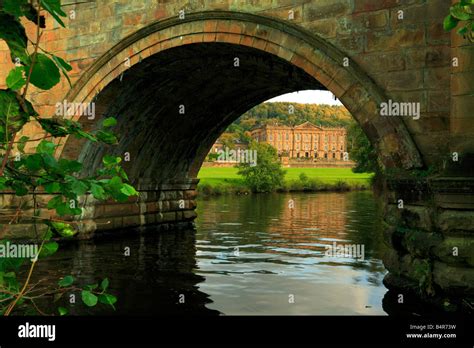 River Derwent And Chatsworth House Viewed Through An Arch Of The Bridge