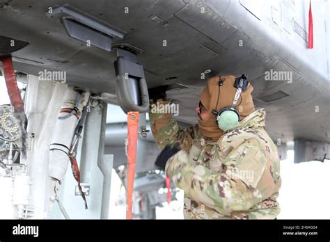 Staff Sgt Omari Castleberry Closes Up Access Panels On An A