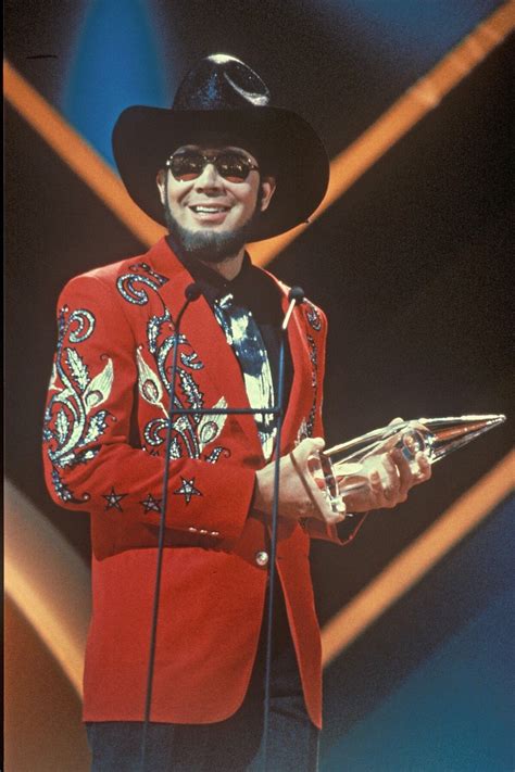 Hank Jr winning his second "Entertainer of the Year" at "The 22nd