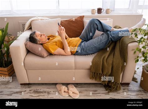 Relaxed Mature Woman Surviving Cancer With Silver Hair In Casual