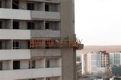 Trabalho alpinista industrial construção fachada pintura parte externa