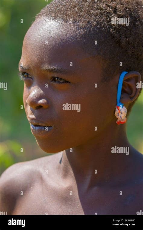 Young Hamer girl with traditional clothings and hairstyle, Hamer tribe ...