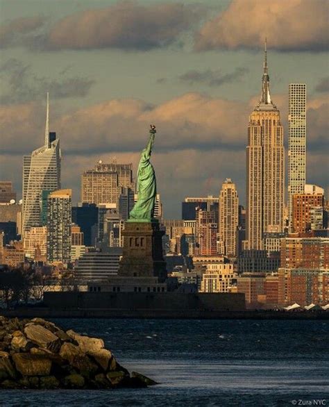 Statue Of Liberty And Empire State Building New York City New York