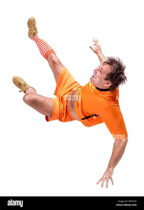 Soccer football player kicking isolated on a white background Stock Photo - Alamy