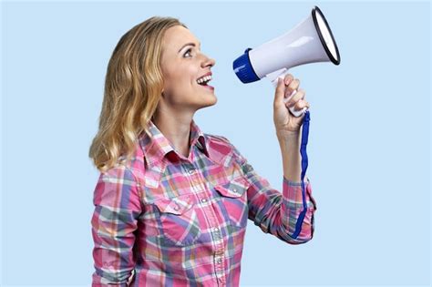 Premium Photo Side View Of Young Pretty Woman Talking Into Megaphone