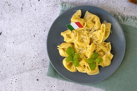 Premium Photo Italian Ravioli In Bowls With Basil Flag Of Italy