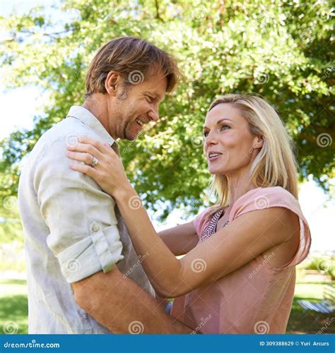 Couple Conversation And Hug In Park For Romance Trust And Commitment