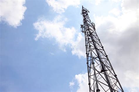 Mobile Phone Communication Tower Transmission Signal With Blue Sky And