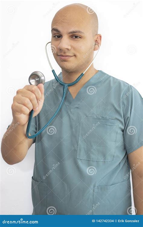 Bald Doctor With Medical Scrubs Stock Photo Image Of Background