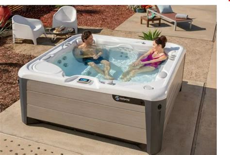 How Much Does A Hot Tub Cost Hot Spring Spas Hot Tub Tub Small