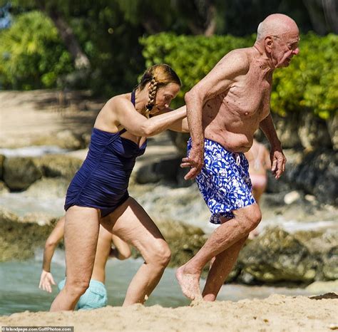 Jerry Hall Hits The Barbados Beach In Chic Halterneck Swimsuit