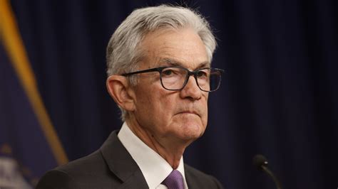 Federal Reserve Holds Interest Rates Steady Projects Three Rate Cuts