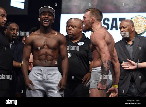 Floyd Mayweather Jr And Conor Mcgregor During The Weigh In At The T Mobile Arena Las Vegas