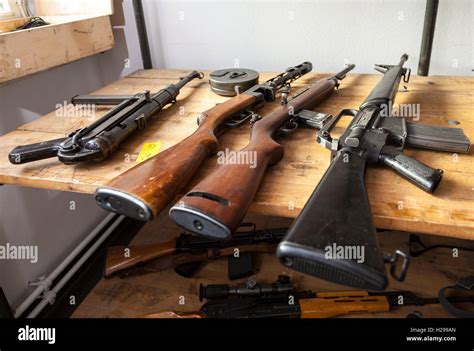 Old Weapons On A Table Stock Photo Alamy