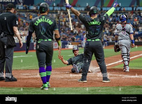 St. Petersburg, FL: Tampa Bay Rays catcher Ben Rortvedt (30) scores on the triple by outfielder ...