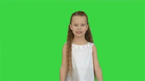 Cute little girl singing a song and danc... | Stock Video | Pond5