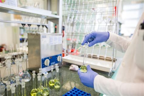 Premium Photo | Flasks with liquids in a lab, pharmaceutical industry ...