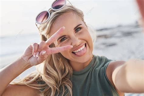 Beach Babe Flashing Peace Sign Outdoor Sun Nature Photo Background And