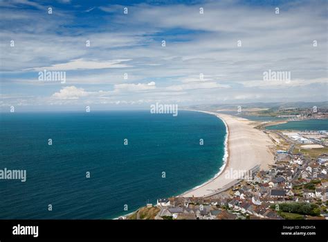 View Across Portland Chesil Beach And Weymouth Harbour Jurassic Coast Dorset England Stock