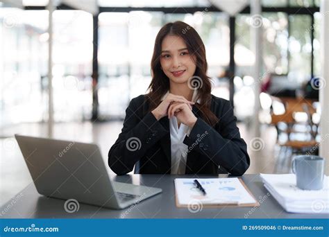 Beautiful Asian Business Woman Working On A Laptop At Office Financial