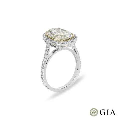 Platinum Fancy Light Yellow Oval Cut Diamond Ring 4 23ct Rich Diamonds