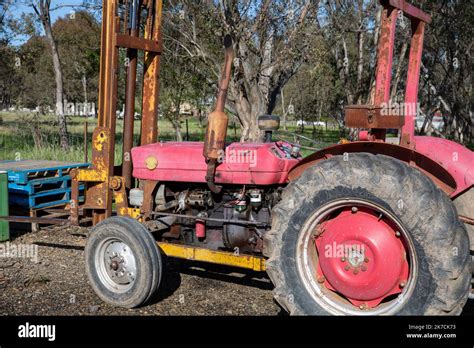 Australian Tractor Farm Equipment Machinery On A Vineyard In Orange