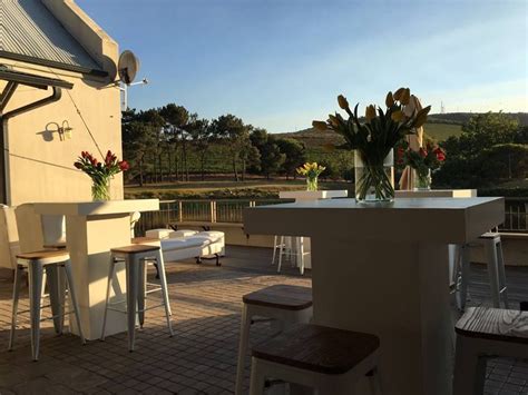 White Plinth Cocktail Tables And Bar Chairs Set Up Cocktail Tables Bar Chairs Outdoor Decor