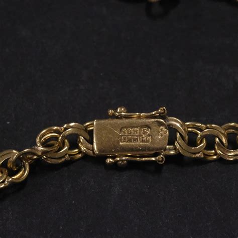 ARMBAND BISMARCK SAMT TRE BERLOCKER 18K GULD Smycken Ädelstenar