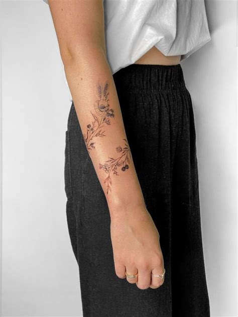 Pin by Eleni Adkins on Tattoo | Wrap tattoo, Flower wrist tattoos, Wrap ...