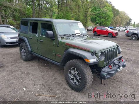 Report 1C4HJXFN5MW606036 JEEP WRANGLER UNLIMITED 2021 Green Gasoline