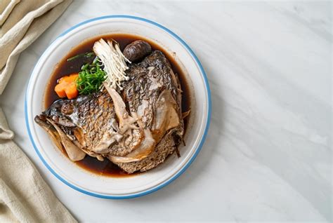 Premium Photo Boiled Fish Head With Soy Sauce