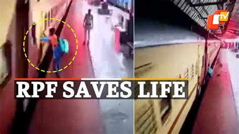 Watch Rpf Jawan Saves Passenger Who Slipped While Boarding Moving