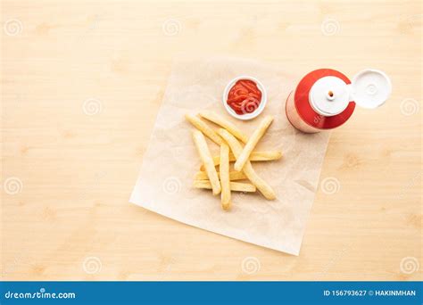 Top View Of French Fried With Tomato Sauce Ketchup On Wood Table