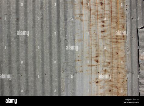 A Rusty Corrugated Iron Metal Fence Close Up Zinc Wall Stock Photo Alamy