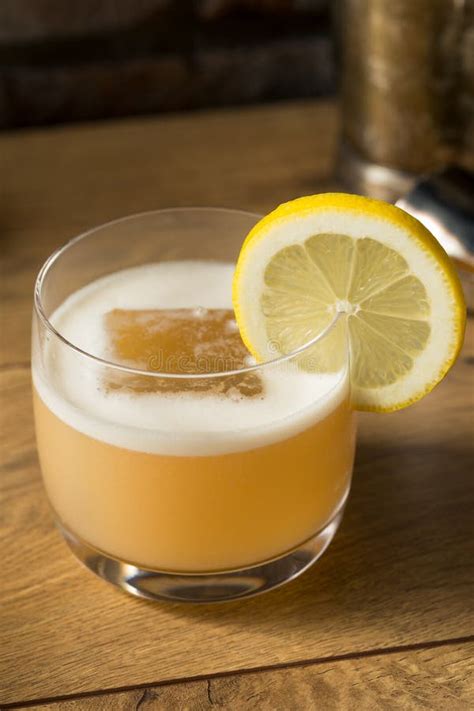 Boozy Refreshing Egg White Whiskey Sour Stock Photo - Image of organic ...