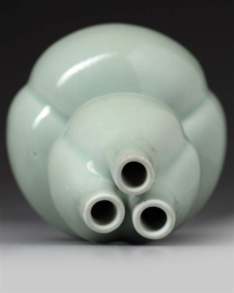 A Chinese Celadon Glazed Triple Gourd Vase