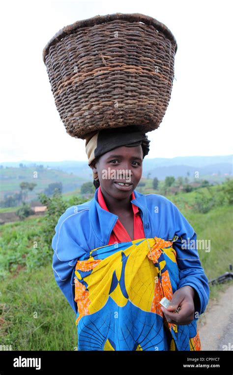 African Woman Carrying Basket On Head Hi Res Stock Photography And