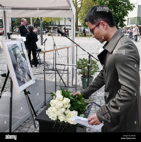 A Student Lays Flowers By A Picture Of Yangjie Li A Chinese