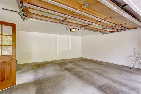 Tips on How to Balance a Garage Door for Homeowners – At Your Service ...