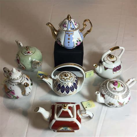 7 assorted miniature teapots(s)