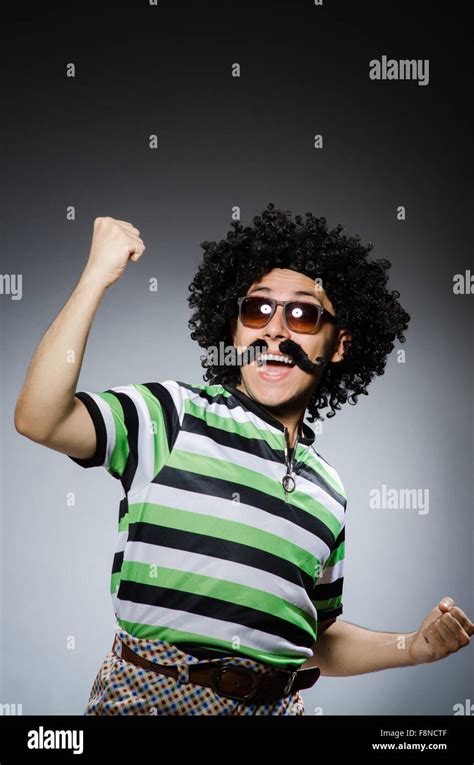 Funny man with afro hairstyle isolated on white Stock Photo - Alamy