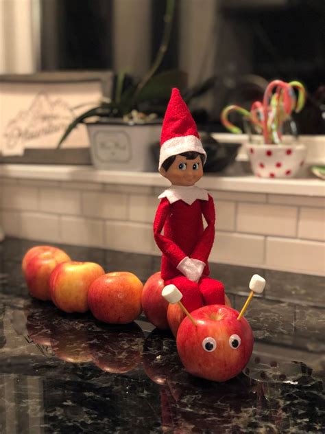 Elf Riding An Apple Caterpillar Elf Elf Fun Elf On The Shelf