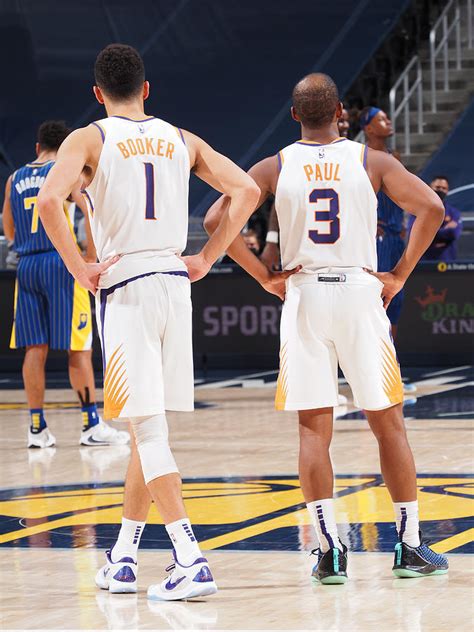 Devin Booker And Chris Paul By Ron Hoskins