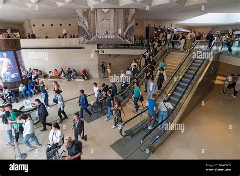 Visitors In The Basement Of The Louvre Pyramid Paris France Stock